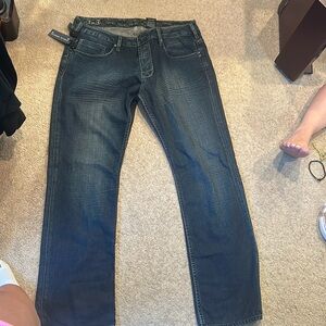 Blue bootcut men’s jeans, not worn and still has a tag